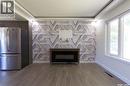 2475 Francis Street, Regina, SK  - Indoor With Fireplace 