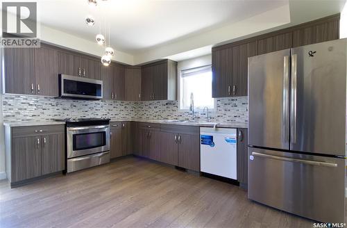 2475 Francis Street, Regina, SK - Indoor Photo Showing Kitchen With Double Sink With Upgraded Kitchen