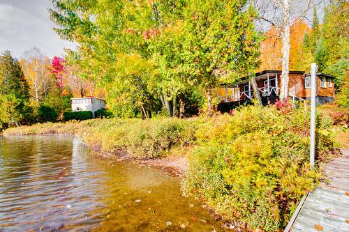 Back facade - 251 Ch. De La Chapelle, Saint-Mathieu-Du-Parc, QC - Outdoor With Body Of Water