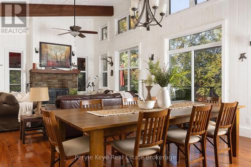 1127 Whispering Pines Trail, Bracebridge (Oakley), ON - Indoor Photo Showing Dining Room With Fireplace