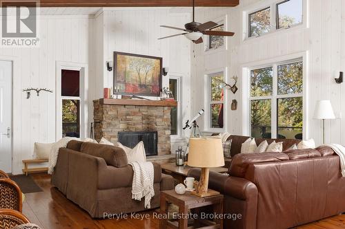 1127 Whispering Pines Trail, Bracebridge (Oakley), ON - Indoor Photo Showing Living Room With Fireplace