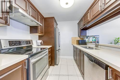 911 - 1450 Glen Abbey Gate, Oakville, ON - Indoor Photo Showing Kitchen With Double Sink