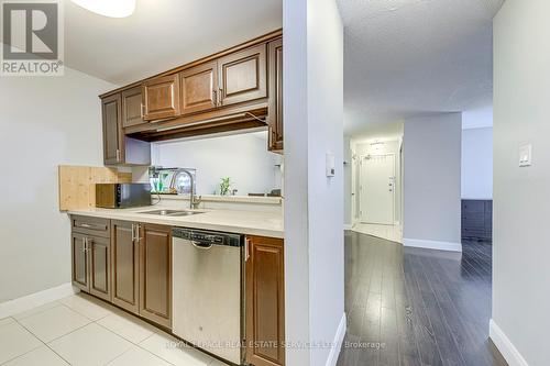 911 - 1450 Glen Abbey Gate, Oakville, ON - Indoor Photo Showing Kitchen With Double Sink