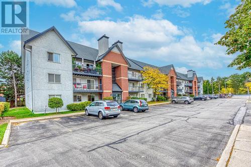 911 - 1450 Glen Abbey Gate, Oakville, ON - Outdoor With Facade