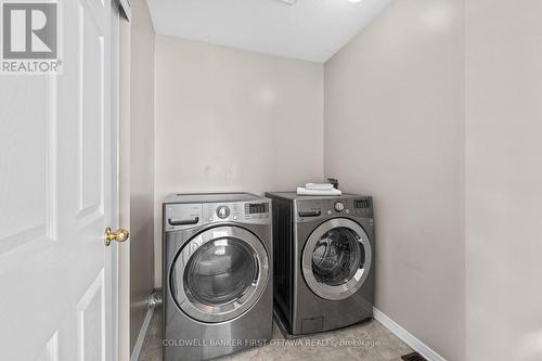2nd lvl laundry room w dbl door storage closet. - 20 Fieldberry Private, Ottawa, ON - Indoor Photo Showing Laundry Room