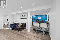 Includes hidden utility room & wet bar area. - 