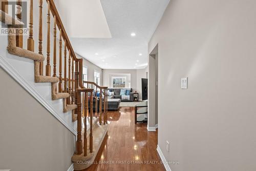 Open main lvl w hardwood floors & pot lights above - 20 Fieldberry Private, Ottawa, ON - Indoor Photo Showing Other Room