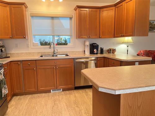 93 Eagle Way, Brandon, MB - Indoor Photo Showing Kitchen With Double Sink