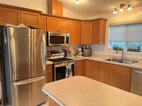 93 Eagle Way, Brandon, MB - Indoor Photo Showing Kitchen With Double Sink