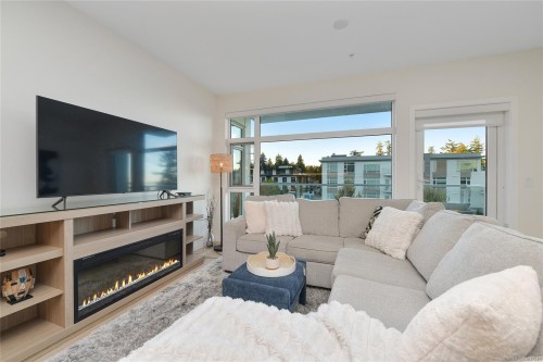 302-5118 Cordova Bay Rd, Saanich, BC - Indoor Photo Showing Living Room With Fireplace