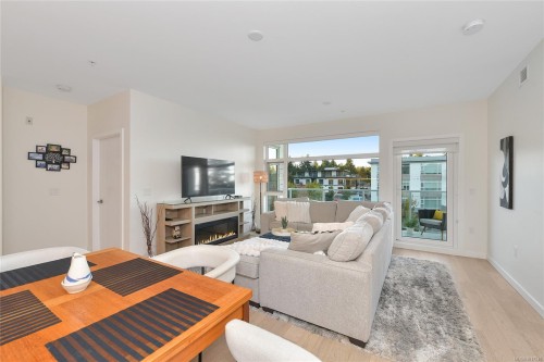 302-5118 Cordova Bay Rd, Saanich, BC - Indoor Photo Showing Living Room With Fireplace