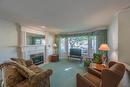 53-3333 South Main Street, Penticton, BC  - Indoor Photo Showing Living Room With Fireplace 