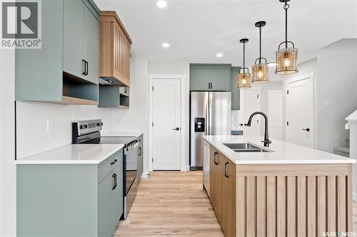 1721 Mustard Street, Regina, SK - Indoor Photo Showing Kitchen With Double Sink With Upgraded Kitchen