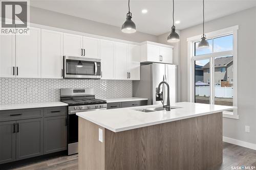 1753 West Market Street, Regina, SK - Indoor Photo Showing Kitchen With Double Sink With Upgraded Kitchen