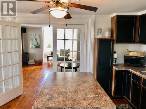 French doors between living room and eat-in kitche - 62 West Street, Port Colborne (Sugarloaf), ON - Indoor