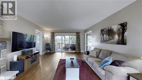 Bedroom with a textured ceiling, light carpet, and a chandelier - 4905 First Line, Erin, ON - Indoor Photo Showing Bedroom