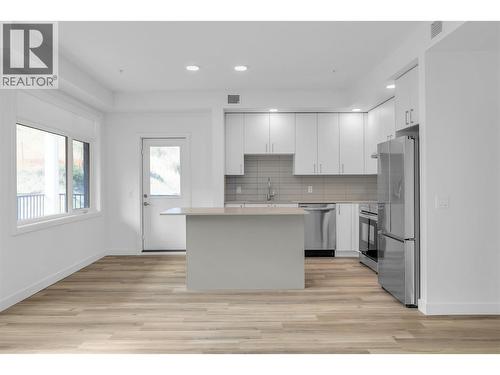 2 Bed | 2 Bath Merlot Condo- Photos are of a similar home; some features may vary - 1057 Frost Road Unit# 118, Kelowna, BC - Indoor Photo Showing Kitchen With Stainless Steel Kitchen With Upgraded Kitchen