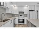 Kitchen- Photos are of a similar home; some features may vary - 1057 Frost Road Unit# 118, Kelowna, BC  - Indoor Photo Showing Kitchen With Stainless Steel Kitchen With Double Sink With Upgraded Kitchen 