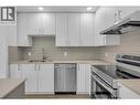 Kitchen- Photos are of a similar home; some features may vary - 1057 Frost Road Unit# 118, Kelowna, BC  - Indoor Photo Showing Kitchen With Stainless Steel Kitchen With Double Sink With Upgraded Kitchen 