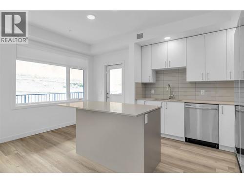 Kitchen- Photos are of a similar home; some features may vary - 1057 Frost Road Unit# 118, Kelowna, BC - Indoor Photo Showing Kitchen With Upgraded Kitchen