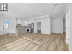 Kitchen, Dining & Living- Photos are of a similar home; some features may vary - 