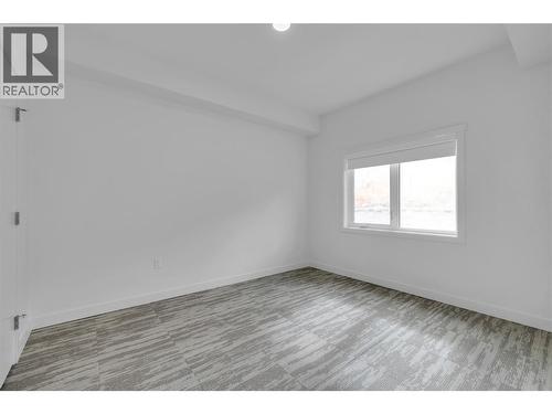 Bedroom 2- Photos are of a similar home; some features may vary - 1057 Frost Road Unit# 118, Kelowna, BC - Indoor Photo Showing Other Room
