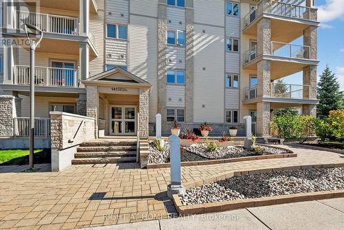 Exterior front accessible ramp - 306 - 141 Potts Private, Ottawa, ON - Outdoor With Balcony With Facade