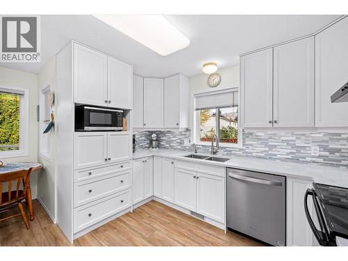 1160 Kneller Court, Kelowna, BC - Indoor Photo Showing Kitchen With Double Sink