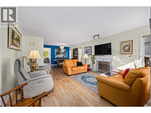 1160 Kneller Court, Kelowna, BC - Indoor Photo Showing Living Room With Fireplace