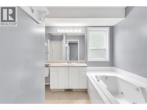 Bathtub and shower in the ensuite. - 2241 Majoros Road, West Kelowna, BC - Indoor Photo Showing Bathroom