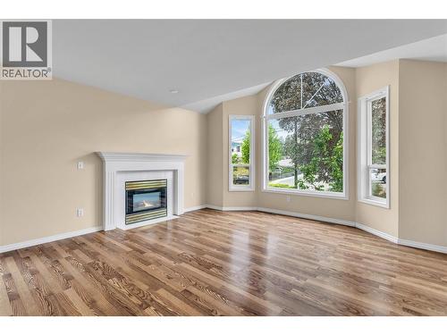 Gas fireplace. - 2241 Majoros Road, West Kelowna, BC - Indoor Photo Showing Living Room With Fireplace
