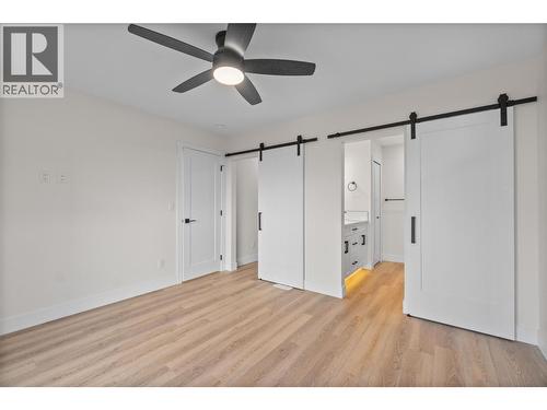 Primary barn door feature - 730 Elderberry Walk, Sicamous, BC 