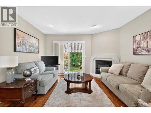 545 Glenmeadows Road Unit# 24, Kelowna, BC - Indoor Photo Showing Living Room With Fireplace