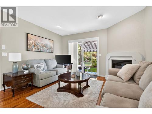 545 Glenmeadows Road Unit# 24, Kelowna, BC - Indoor Photo Showing Living Room With Fireplace