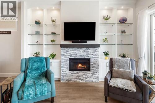 496 Silversage Place Unit# 2, Vernon, BC - Indoor Photo Showing Living Room With Fireplace