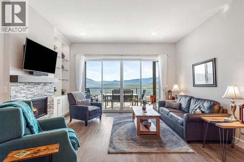 496 Silversage Place Unit# 2, Vernon, BC - Indoor Photo Showing Living Room With Fireplace