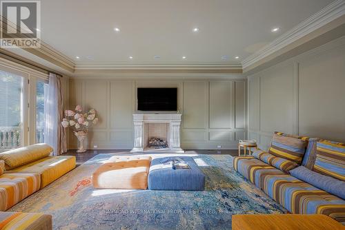 32 Arjay Crescent, Toronto, ON - Indoor Photo Showing Living Room With Fireplace