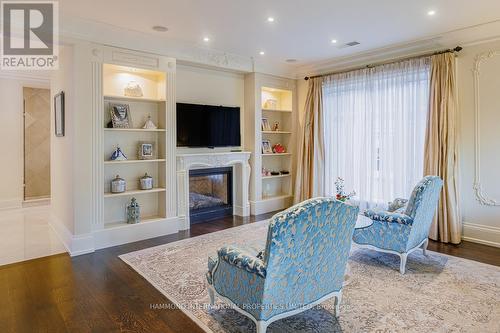 32 Arjay Crescent, Toronto, ON - Indoor Photo Showing Living Room With Fireplace