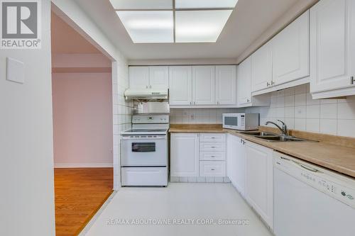 1415 - 135 Hillcrest Avenue, Mississauga, ON - Indoor Photo Showing Kitchen With Double Sink