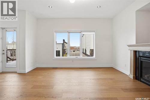 2106 Laurier Crescent E, Regina, SK - Indoor With Fireplace