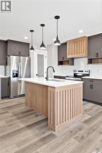 411 Kinloch Crescent, Saskatoon, SK - Indoor Photo Showing Kitchen With Upgraded Kitchen