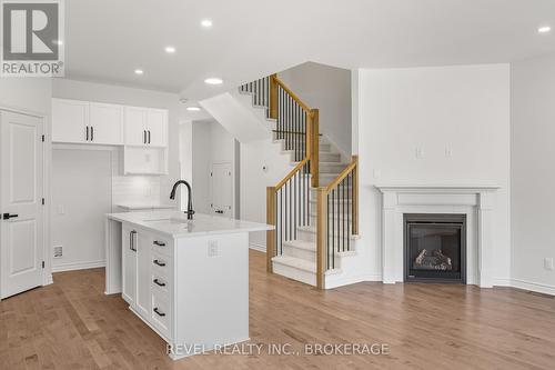 332 Dockside Drive, Kingston (Kingston East (Incl Barret Crt)), ON - Indoor With Fireplace