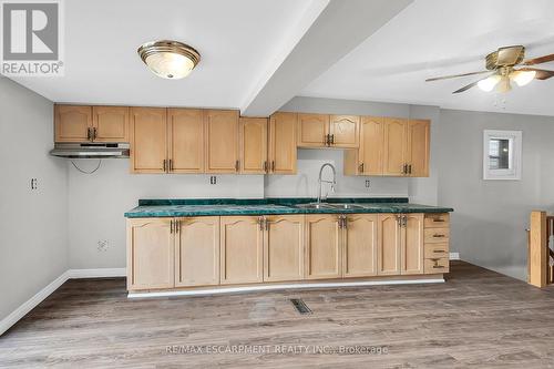 1256 Cannon Street E, Hamilton, ON - Indoor Photo Showing Kitchen With Double Sink