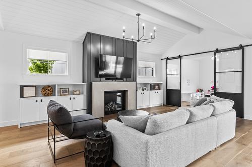 4243 Russo Street, Kelowna, BC - Indoor Photo Showing Living Room With Fireplace