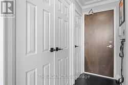 Foyer w/ coat closet & a deep closet w/ organizers - 