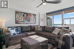 Living room w/ a walkout to balcony - 