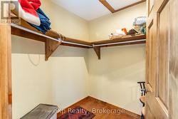 Walk in primary closet - 