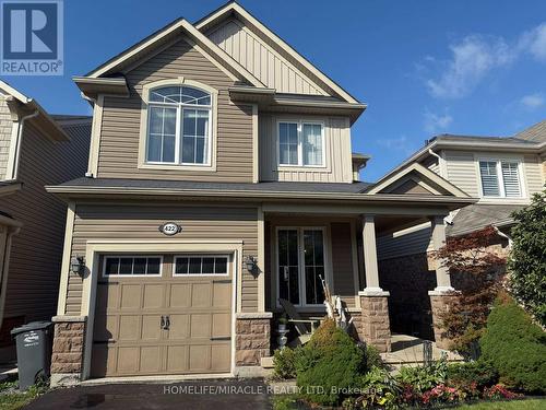 422 Cavanagh Lane, Milton, ON - Outdoor With Facade
