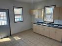 619 10Th Street, Brandon, MB  - Indoor Photo Showing Kitchen With Double Sink 