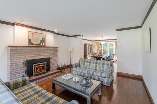 Living room - 189 Ch. Wheeler, Mont-Tremblant, QC - Indoor Photo Showing Living Room With Fireplace
